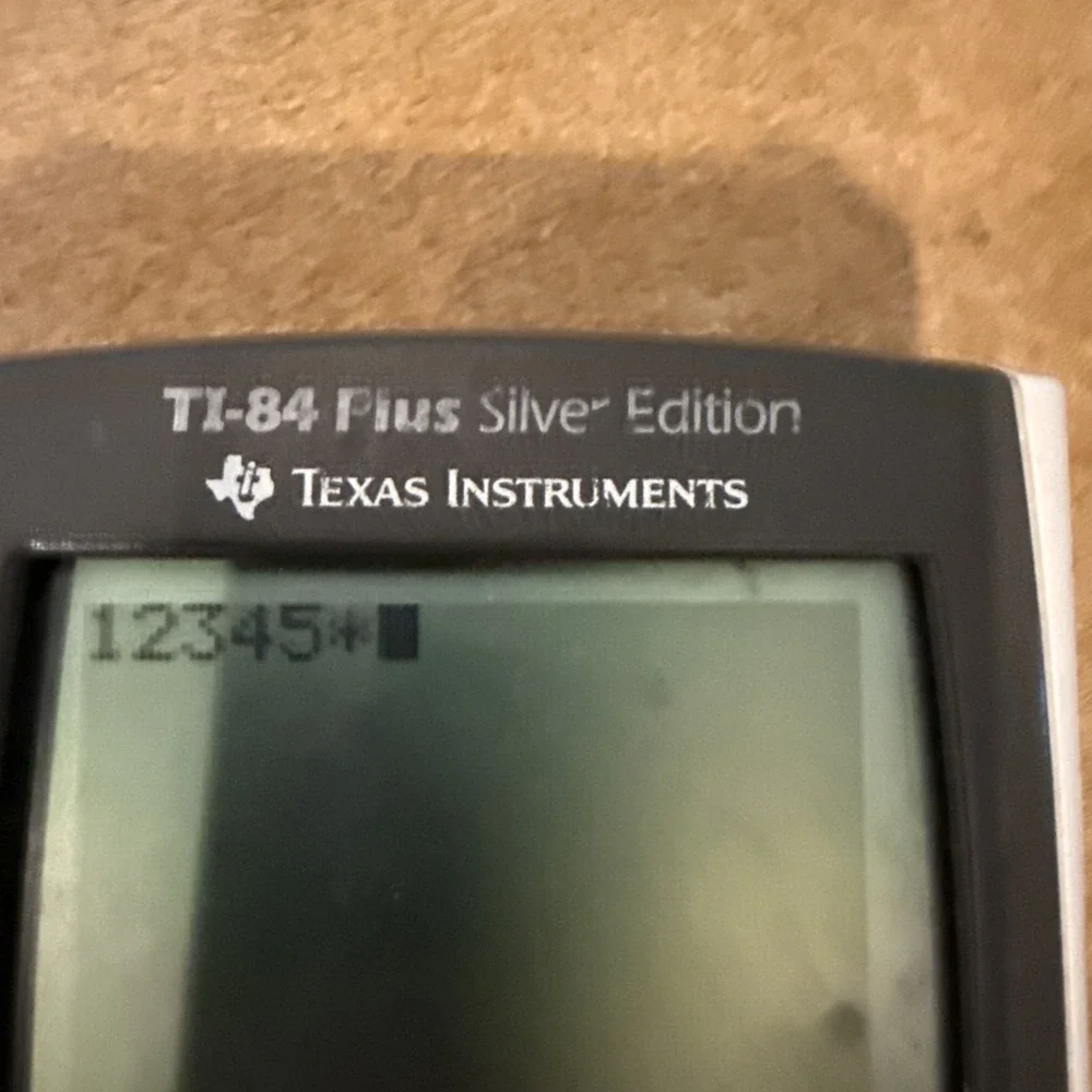 ti 84 plus silver edition pink.  Works Great !‎
